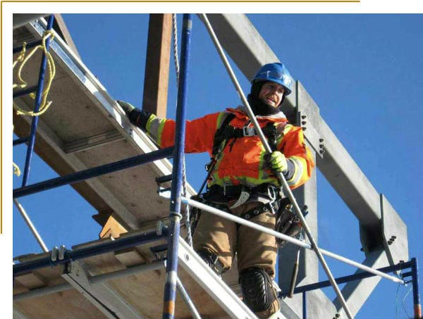 construction man on a scaffold in protective gear