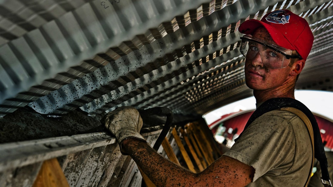 man working with protective glasses