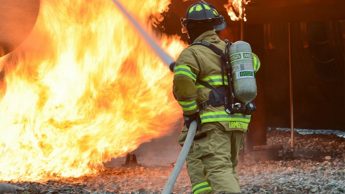 fireman extinguishing a fire