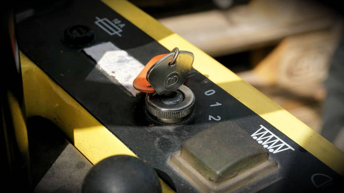 machinery_orig a key in the ignition of a large piece of machinery.